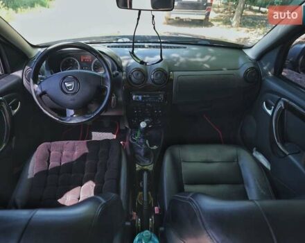 Черный Дачия Duster, объемом двигателя 1.46 л и пробегом 285 тыс. км за 8700 $, фото 2 на Automoto.ua