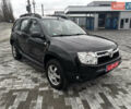 Черный Дачия Duster, объемом двигателя 1.6 л и пробегом 181 тыс. км за 8300 $, фото 4 на Automoto.ua