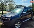 Черный Дачия Duster, объемом двигателя 1.6 л и пробегом 143 тыс. км за 8500 $, фото 2 на Automoto.ua