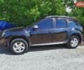 Черный Дачия Duster, объемом двигателя 1.46 л и пробегом 285 тыс. км за 8700 $, фото 1 на Automoto.ua