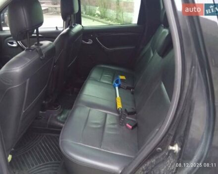 Черный Дачия Duster, объемом двигателя 1.6 л и пробегом 238 тыс. км за 9100 $, фото 5 на Automoto.ua