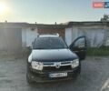 Черный Дачия Duster, объемом двигателя 1.6 л и пробегом 200 тыс. км за 8099 $, фото 1 на Automoto.ua