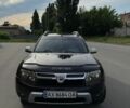 Черный Дачия Duster, объемом двигателя 1.6 л и пробегом 260 тыс. км за 9200 $, фото 1 на Automoto.ua