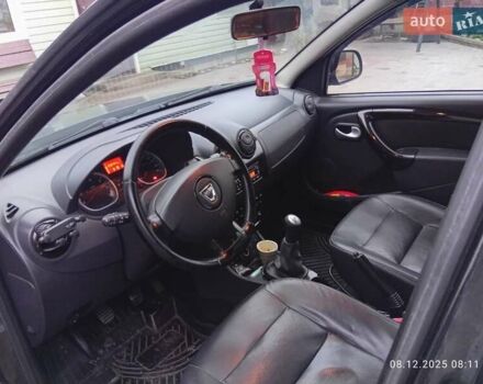 Черный Дачия Duster, объемом двигателя 1.6 л и пробегом 238 тыс. км за 9100 $, фото 4 на Automoto.ua