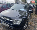 Черный Дачия Duster, объемом двигателя 1.6 л и пробегом 142 тыс. км за 8300 $, фото 1 на Automoto.ua