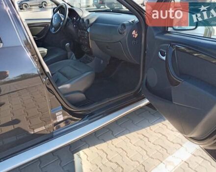 Черный Дачия Duster, объемом двигателя 1.6 л и пробегом 240 тыс. км за 10000 $, фото 11 на Automoto.ua