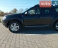 Черный Дачия Duster, объемом двигателя 1.6 л и пробегом 240 тыс. км за 10000 $, фото 14 на Automoto.ua