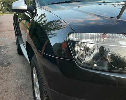 Черный Дачия Duster, объемом двигателя 1.6 л и пробегом 210 тыс. км за 9199 $, фото 2 на Automoto.ua