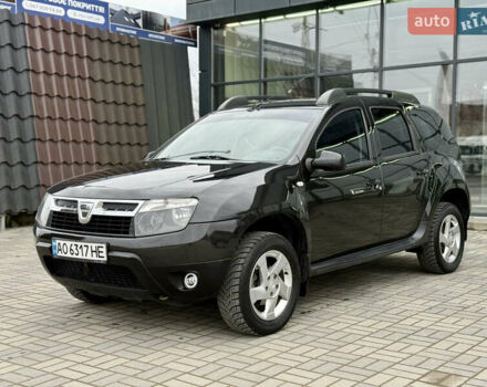 Чорний Дачія Duster, об'ємом двигуна 1.6 л та пробігом 175 тис. км за 7900 $, фото 1 на Automoto.ua