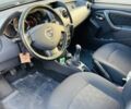 Черный Дачия Duster, объемом двигателя 1.6 л и пробегом 170 тыс. км за 11990 $, фото 4 на Automoto.ua