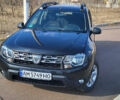 Черный Дачия Duster, объемом двигателя 1.2 л и пробегом 120 тыс. км за 9900 $, фото 1 на Automoto.ua