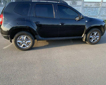 Черный Дачия Duster, объемом двигателя 1.6 л и пробегом 227 тыс. км за 10850 $, фото 1 на Automoto.ua