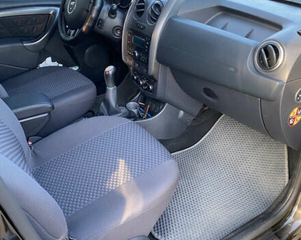 Черный Дачия Duster, объемом двигателя 1.6 л и пробегом 227 тыс. км за 10850 $, фото 12 на Automoto.ua