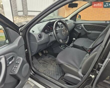 Чорний Дачія Duster, об'ємом двигуна 1.6 л та пробігом 71 тис. км за 11750 $, фото 13 на Automoto.ua