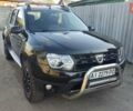 Черный Дачия Duster, объемом двигателя 1.2 л и пробегом 106 тыс. км за 12000 $, фото 1 на Automoto.ua