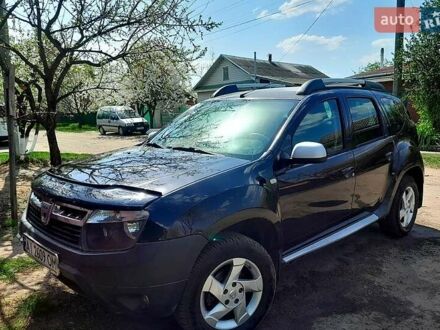 Черный Дачия Duster, объемом двигателя 1.6 л и пробегом 143 тыс. км за 8500 $, фото 1 на Automoto.ua