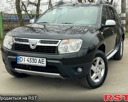Черный Дачия Duster, объемом двигателя 1.6 л и пробегом 155 тыс. км за 9100 $, фото 1 на Automoto.ua