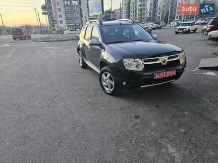 Черный Дачия Duster, объемом двигателя 1.6 л и пробегом 220 тыс. км за 9500 $, фото 1 на Automoto.ua