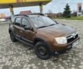 Коричневый Дачия Duster, объемом двигателя 1.5 л и пробегом 230 тыс. км за 8600 $, фото 1 на Automoto.ua
