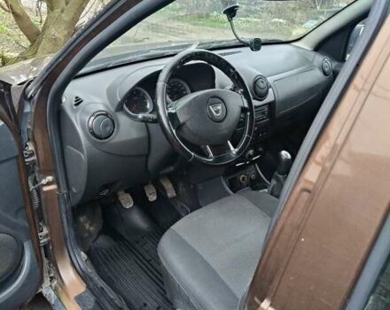 Коричневый Дачия Duster, объемом двигателя 1.5 л и пробегом 230 тыс. км за 8600 $, фото 5 на Automoto.ua