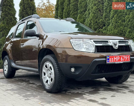 Коричневый Дачия Duster, объемом двигателя 1.6 л и пробегом 170 тыс. км за 8750 $, фото 2 на Automoto.ua
