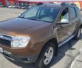 Коричневый Дачия Duster, объемом двигателя 1.6 л и пробегом 170 тыс. км за 8500 $, фото 1 на Automoto.ua