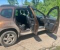 Коричневый Дачия Duster, объемом двигателя 2 л и пробегом 245 тыс. км за 11500 $, фото 1 на Automoto.ua