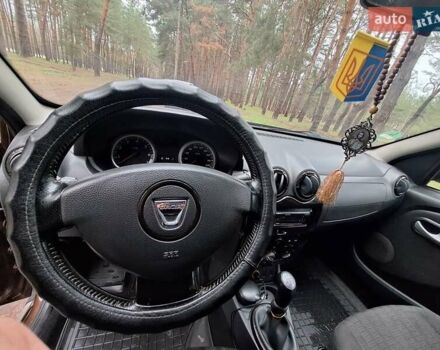 Коричневый Дачия Duster, объемом двигателя 1.6 л и пробегом 212 тыс. км за 8100 $, фото 5 на Automoto.ua