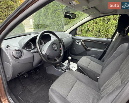 Коричневый Дачия Duster, объемом двигателя 1.6 л и пробегом 170 тыс. км за 8750 $, фото 16 на Automoto.ua