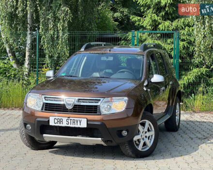 Коричневый Дачия Duster, объемом двигателя 1.6 л и пробегом 167 тыс. км за 8200 $, фото 1 на Automoto.ua
