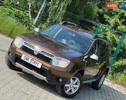 Коричневый Дачия Duster, объемом двигателя 1.6 л и пробегом 167 тыс. км за 8200 $, фото 10 на Automoto.ua