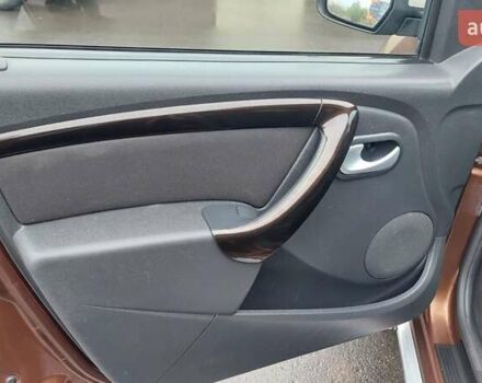 Коричневый Дачия Duster, объемом двигателя 1.6 л и пробегом 225 тыс. км за 7900 $, фото 13 на Automoto.ua