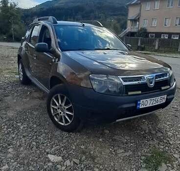 Коричневый Дачия Duster, объемом двигателя 1.46 л и пробегом 305 тыс. км за 7500 $, фото 2 на Automoto.ua