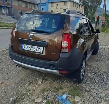 Коричневый Дачия Duster, объемом двигателя 1.46 л и пробегом 305 тыс. км за 7500 $, фото 4 на Automoto.ua