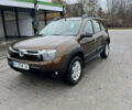 Коричневий Дачія Duster, об'ємом двигуна 1.6 л та пробігом 183 тис. км за 10499 $, фото 1 на Automoto.ua