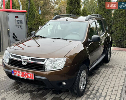 Коричневый Дачия Duster, объемом двигателя 1.6 л и пробегом 170 тыс. км за 8750 $, фото 1 на Automoto.ua