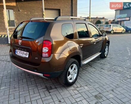 Коричневый Дачия Duster, объемом двигателя 1.46 л и пробегом 187 тыс. км за 8800 $, фото 1 на Automoto.ua