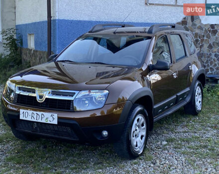Коричневый Дачия Duster, объемом двигателя 1.6 л и пробегом 180 тыс. км за 9400 $, фото 1 на Automoto.ua