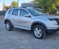 Серый Дачия Duster, объемом двигателя 1.5 л и пробегом 180 тыс. км за 9900 $, фото 1 на Automoto.ua