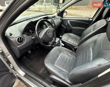 Сірий Дачія Duster, об'ємом двигуна 1.6 л та пробігом 210 тис. км за 9900 $, фото 18 на Automoto.ua