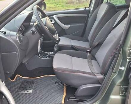 Дачия Duster 2013 в Новоархангельске на Automoto.ua Зеленый Дачия Duster, объемом двигателя 1.5 л и пробегом 198 тыс. км за 10500 $, фото 41 на Automoto.ua