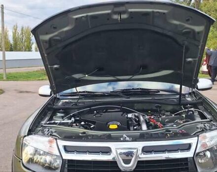 Дачия Duster 2013 в Новоархангельске на Automoto.ua Зеленый Дачия Duster, объемом двигателя 1.5 л и пробегом 198 тыс. км за 10500 $, фото 32 на Automoto.ua