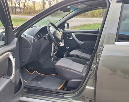 Дачия Duster 2013 в Новоархангельске на Automoto.ua Зеленый Дачия Duster, объемом двигателя 1.5 л и пробегом 198 тыс. км за 10500 $, фото 11 на Automoto.ua