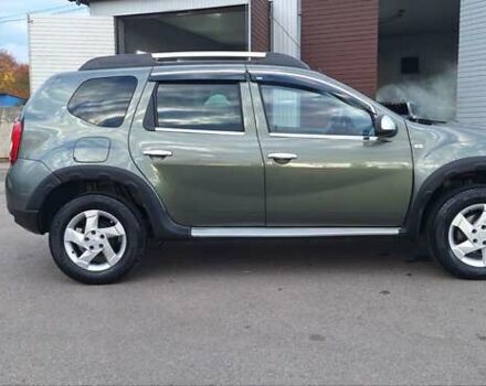Дачия Duster 2013 в Новоархангельске на Automoto.ua Зеленый Дачия Duster, объемом двигателя 1.5 л и пробегом 198 тыс. км за 10500 $, фото 1 на Automoto.ua