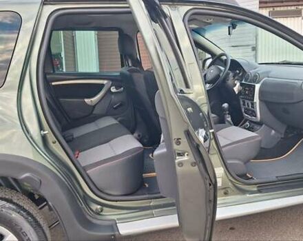 Дачия Duster 2013 в Новоархангельске на Automoto.ua Зеленый Дачия Duster, объемом двигателя 1.5 л и пробегом 198 тыс. км за 10500 $, фото 14 на Automoto.ua