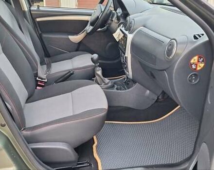 Дачия Duster 2013 в Новоархангельске на Automoto.ua Зеленый Дачия Duster, объемом двигателя 1.5 л и пробегом 198 тыс. км за 10500 $, фото 75 на Automoto.ua