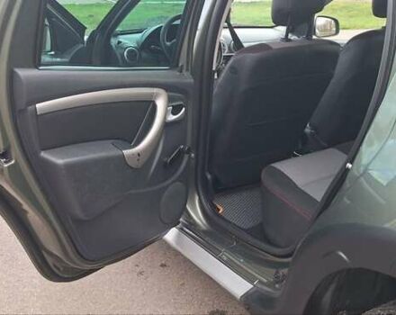 Дачия Duster 2013 в Новоархангельске на Automoto.ua Зеленый Дачия Duster, объемом двигателя 1.5 л и пробегом 198 тыс. км за 10500 $, фото 49 на Automoto.ua