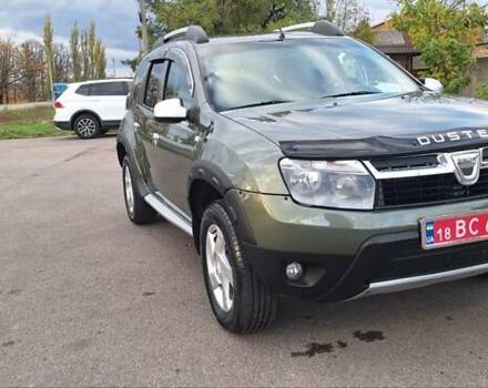 Дачия Duster 2013 в Новоархангельске на Automoto.ua Зеленый Дачия Duster, объемом двигателя 1.5 л и пробегом 198 тыс. км за 10500 $, фото 35 на Automoto.ua