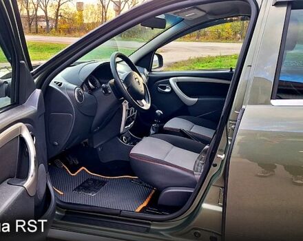 Зеленый Дачия Duster, объемом двигателя 1.5 л и пробегом 198 тыс. км за 10500 $, фото 7 на Automoto.ua