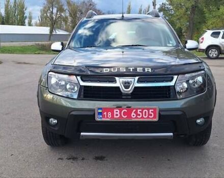 Дачия Duster 2013 в Новоархангельске на Automoto.ua Зеленый Дачия Duster, объемом двигателя 1.5 л и пробегом 198 тыс. км за 10500 $, фото 4 на Automoto.ua